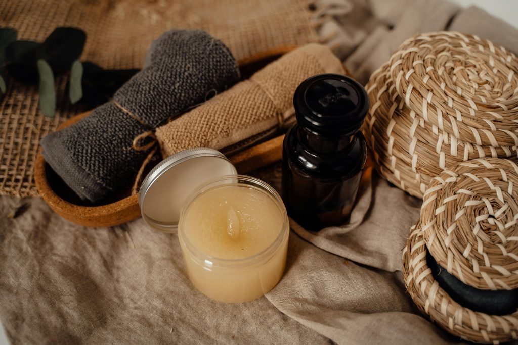Aesthetic display of skincare essentials with towels and wicker baskets, ideal for relaxation themes.